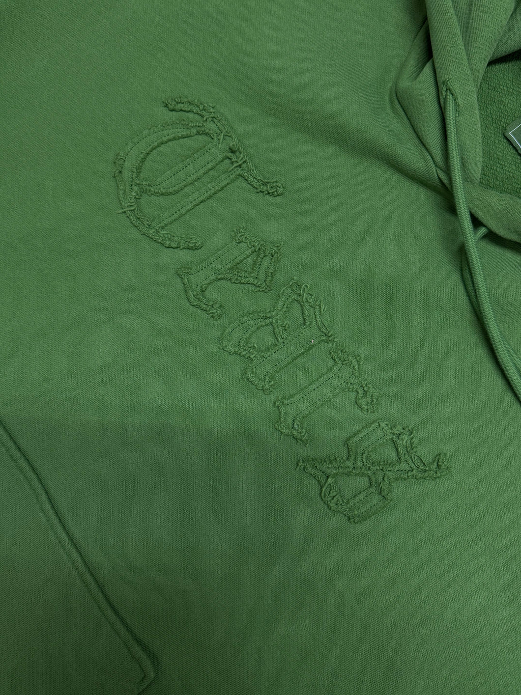 Denim Tears Cut Out Tears Hoodie in the Cactus Green