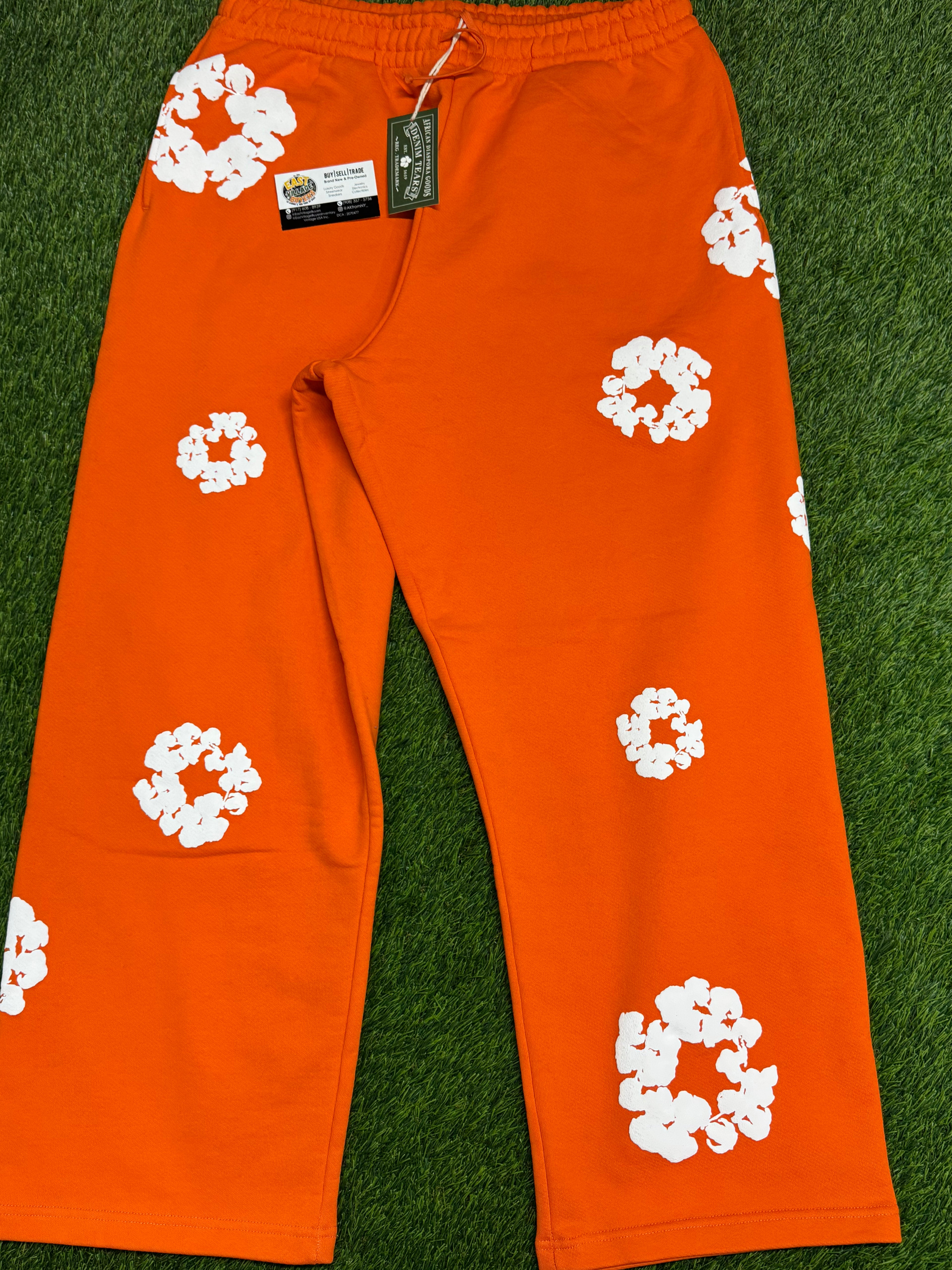 Denim Tears Cotton Wreath Baggy Sweatpants in Orange