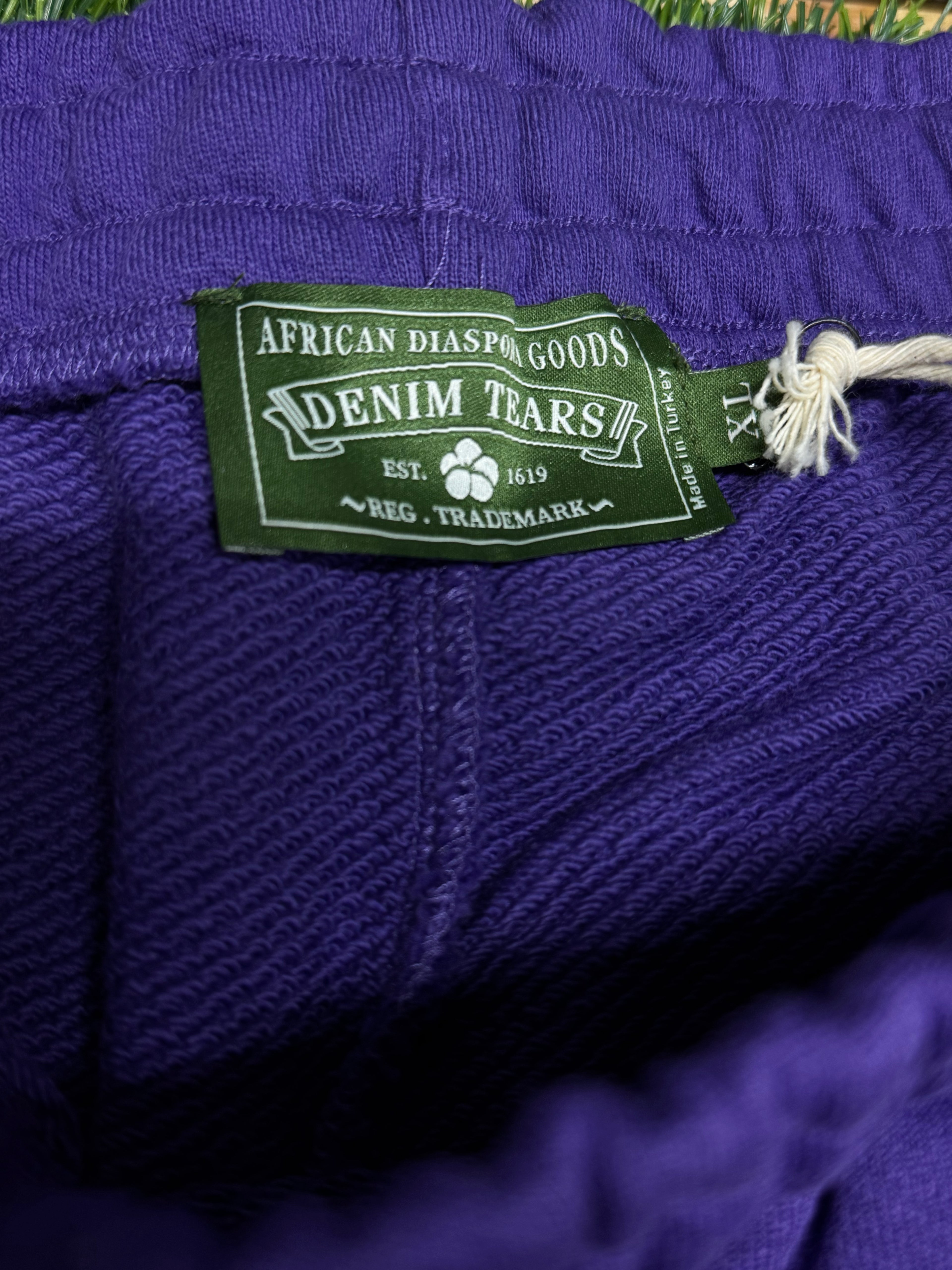 Denim Tears Cotton Wreath Baggy Sweatpants in Purple