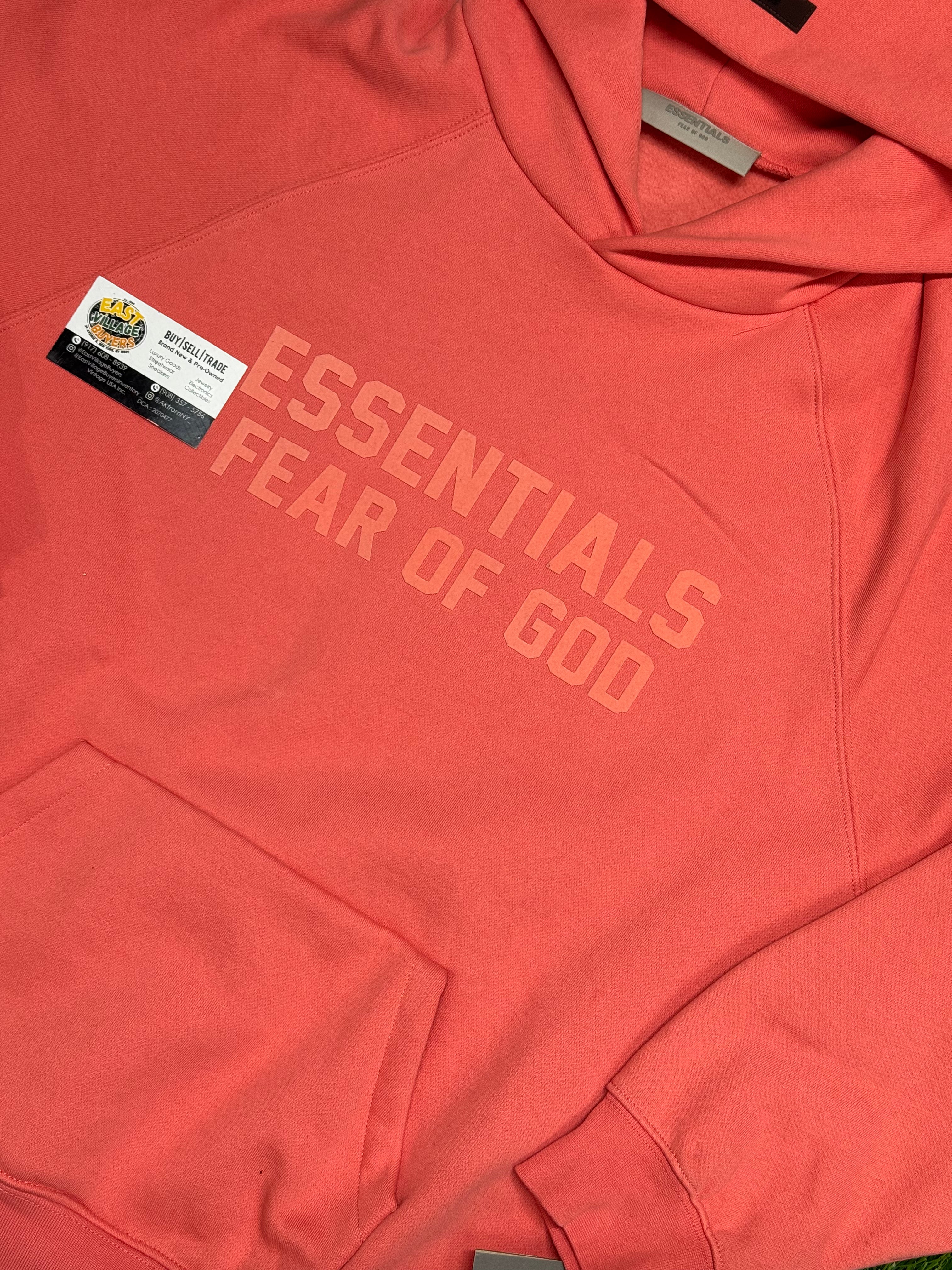 Essentials Fear Of God Hoodie in the Coral colorway